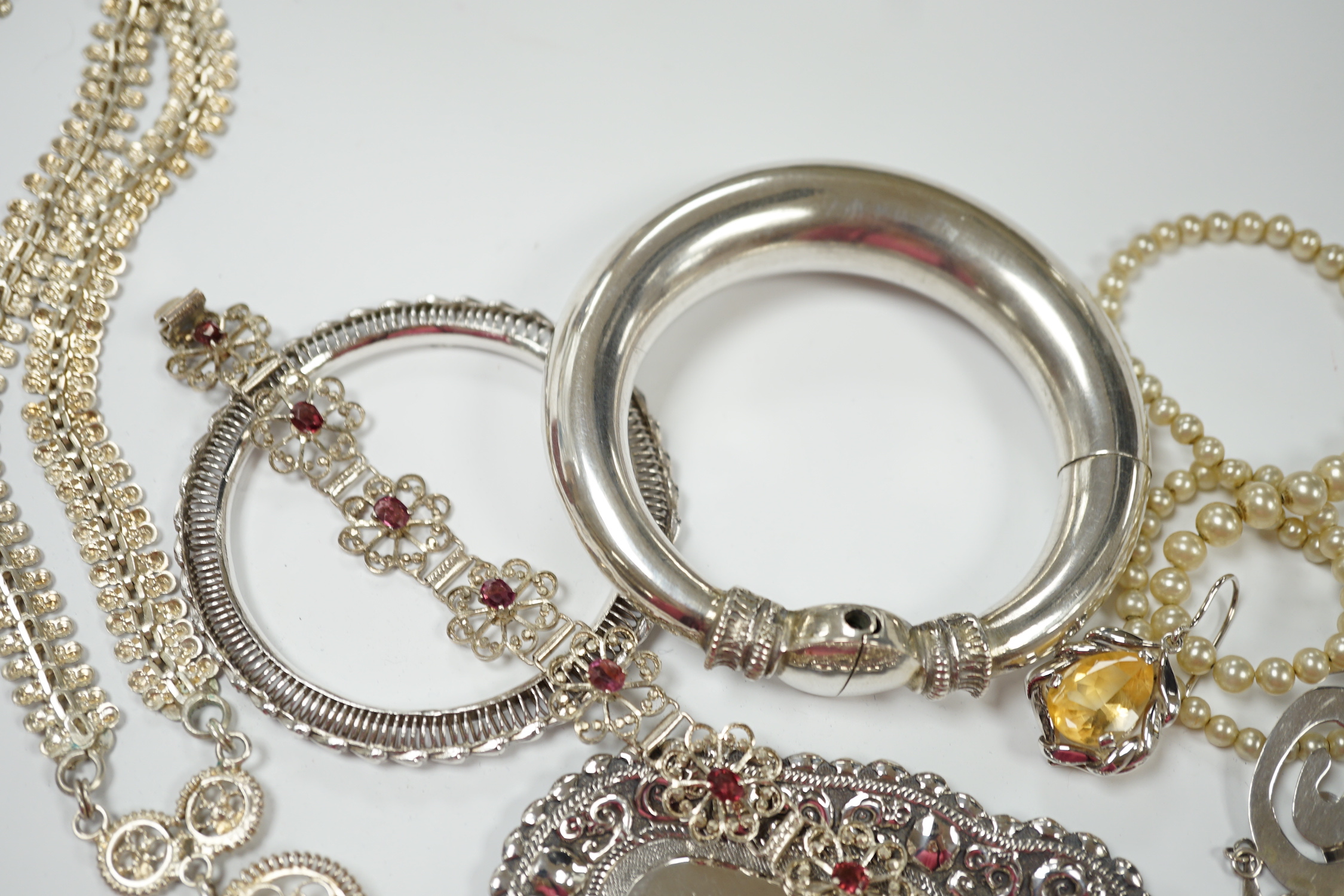 A quantity of assorted white metal jewellery, including bangle, necklace, earrings, etc.